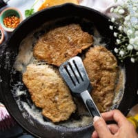 seared until golden veal that's flipped in the cast iron pan