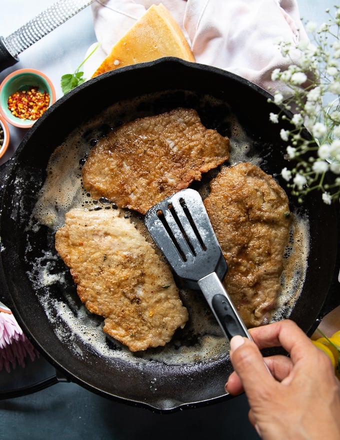 seared until golden veal that's flipped in the cast iron pan