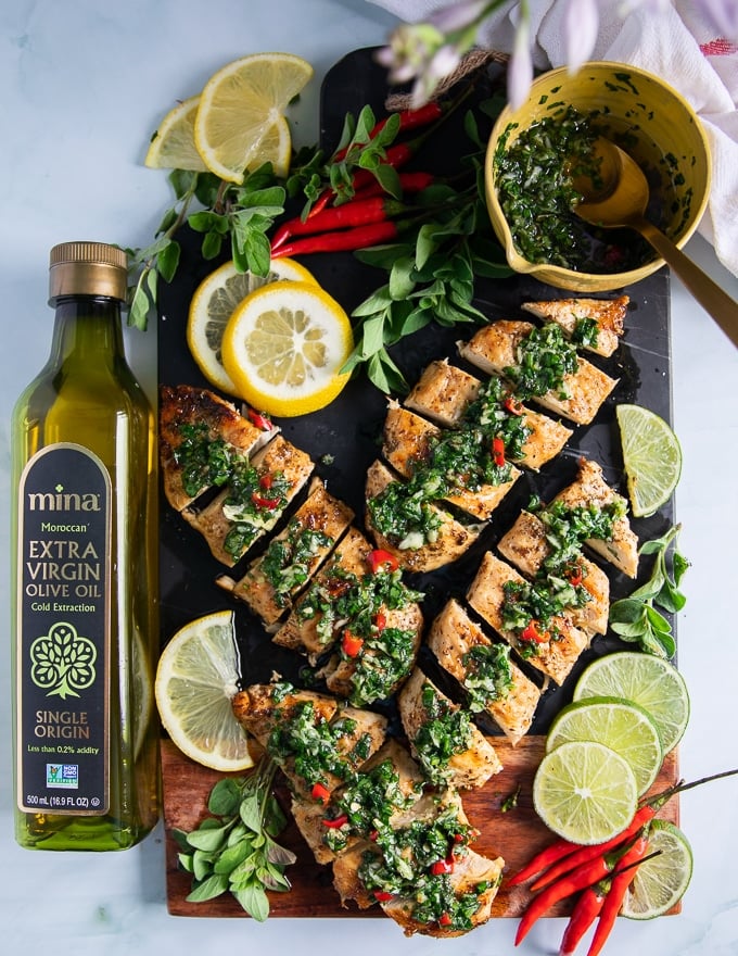 sliced chicken breast strips drenched in chimichurri sauce