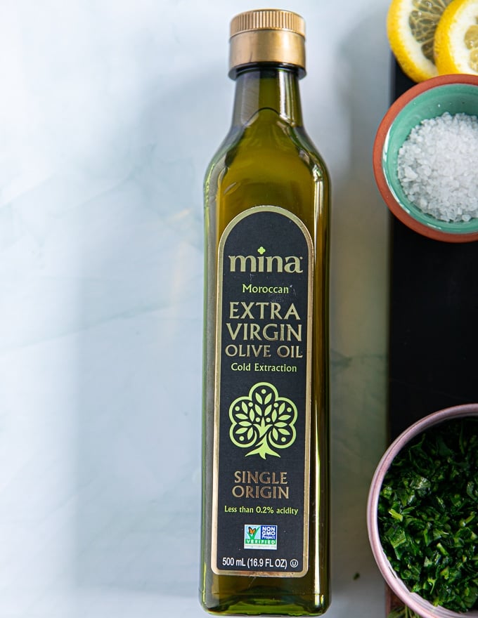 A bottle of Moroccan Olive oil on a marble