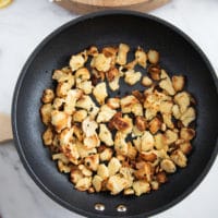 golden toasted bread chunks in the skillet ready