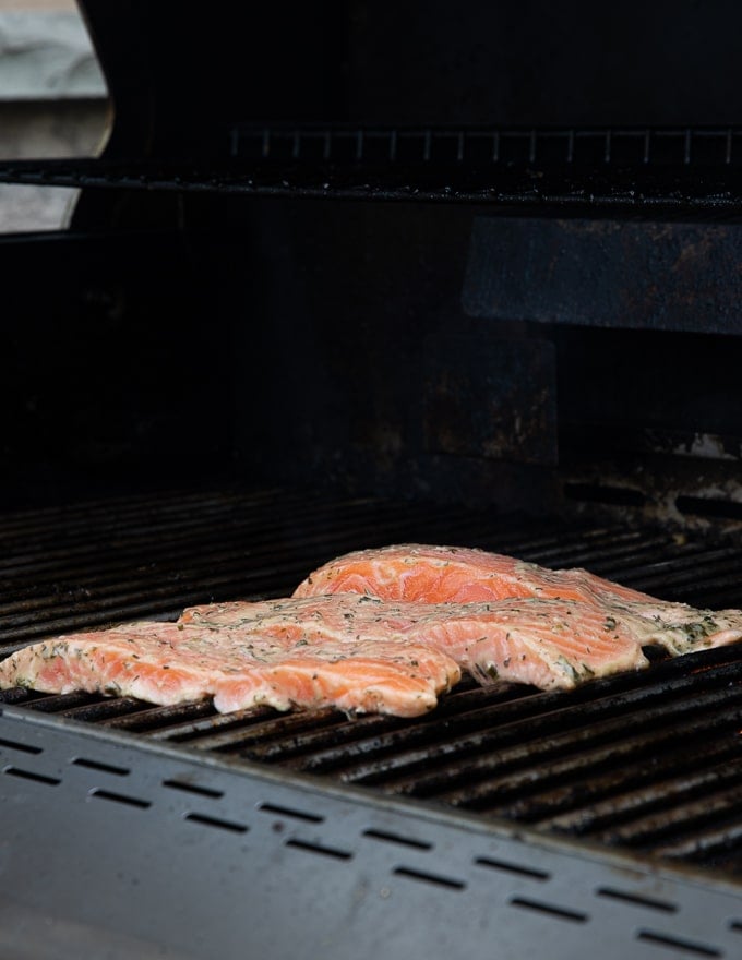 marinated salmon fillets on a BBQ grill 