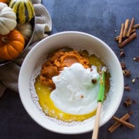 the wet ingredients added into one bowl to make the pumpkin donuts recipe
