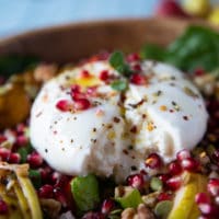 close up of the sliced burrata cheese showing the inside cream