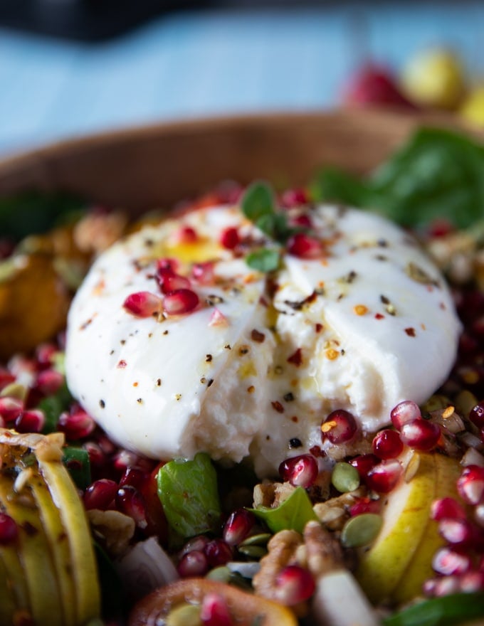 close up of the sliced burrata cheese showing the inside cream