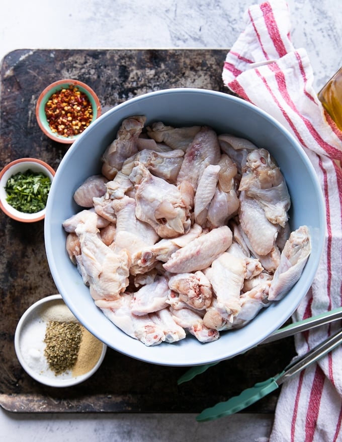 fresh chicken wings in a large bowl