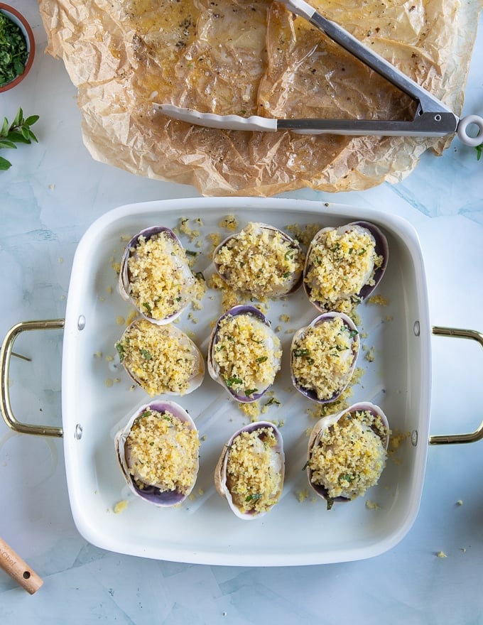 the topping is added over the scallops before baking 