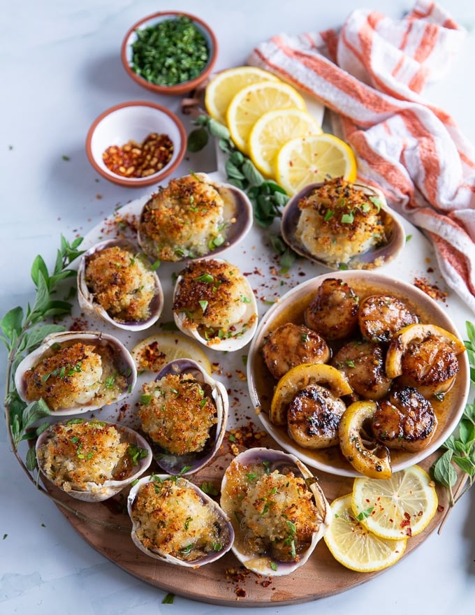 A platter with the finished baked scallops and pan seared scallops