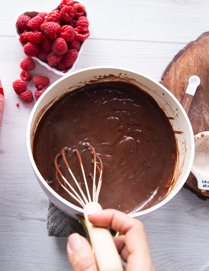 Mixing pudding with a whisk.