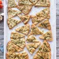 Pita chips out of the oven golden and perfectly baked crispy