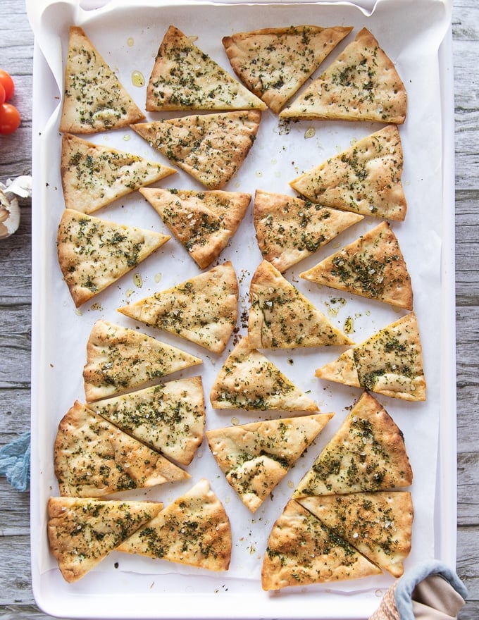 Pita chips out of the oven golden and perfectly baked crispy
