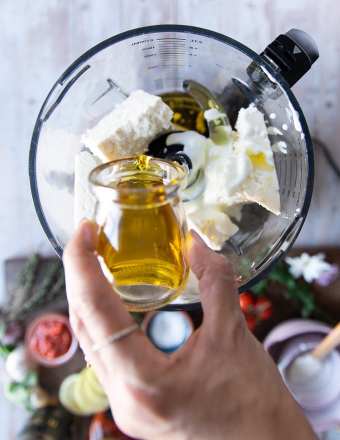 all ingredients for whipped feta added in the food processor