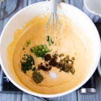 A combination of spices and flavoring added over the pot to flavor the nacho cheese sauce recipe which is optional