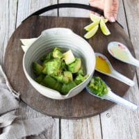 avocado layer ingredients including diced avocado, scallions, lime juice, oil