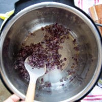 Onions being sautéed to make the birria stew