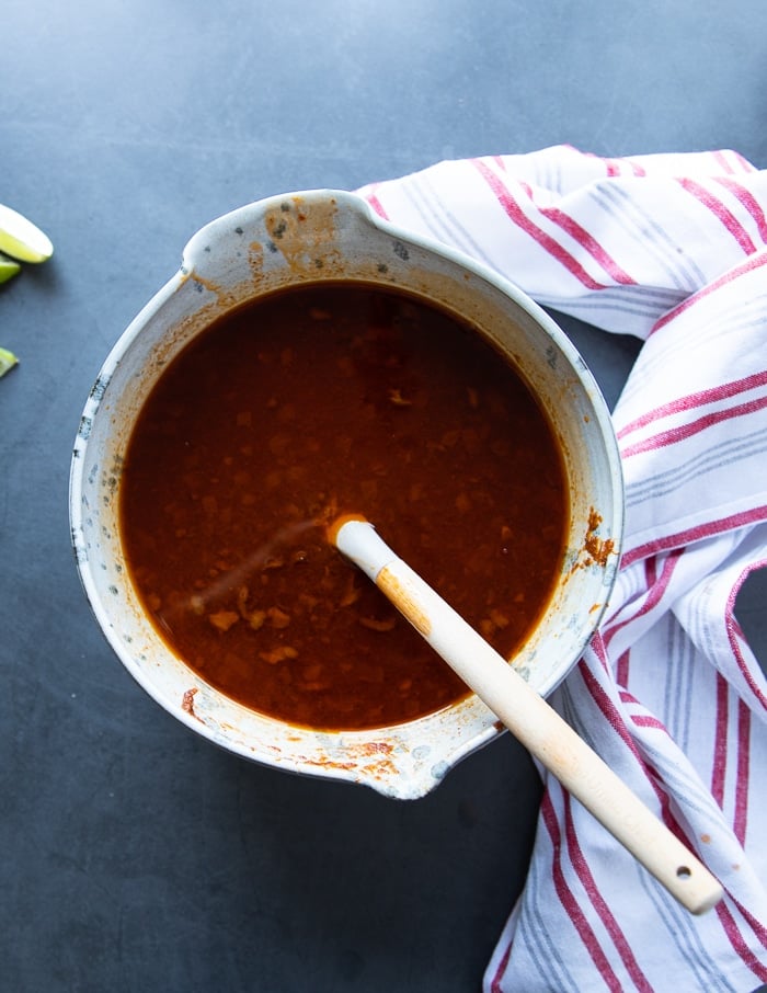 the bowl of sauce after removing the cooked beef