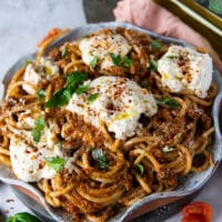 final plated burrata pasta garnished with fresh basil