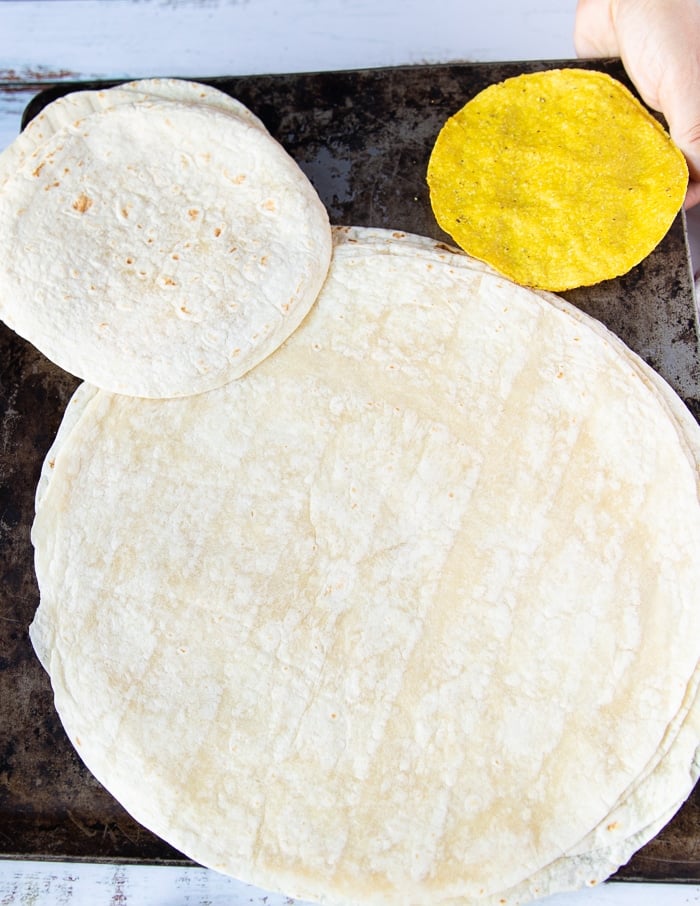 different sized of tortillas used for the crunchwrap supreme including the large size and the smaller size