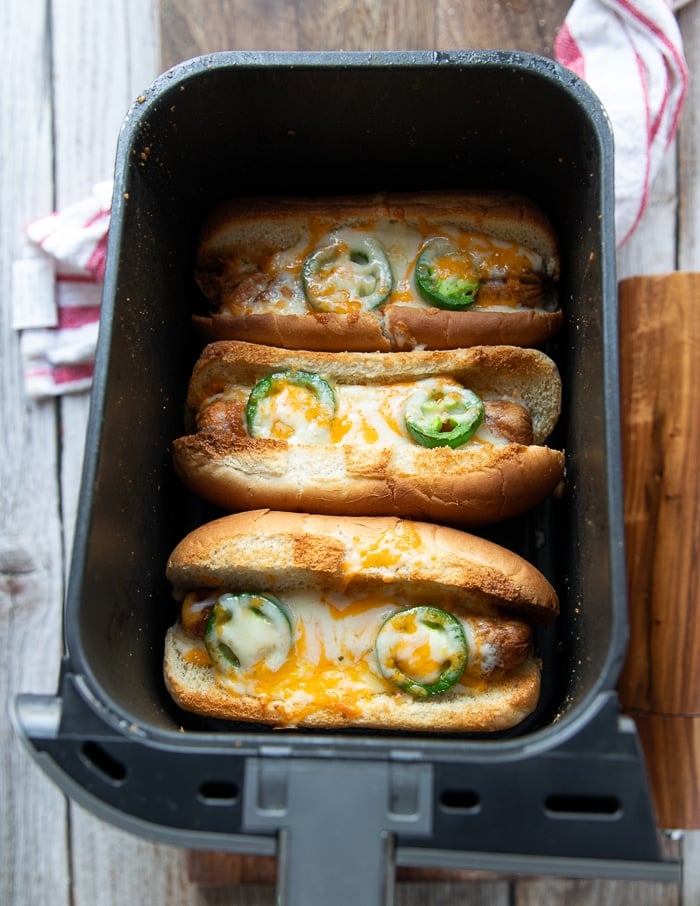 cheesy hot dog buns out of the air fryer with cheese melted