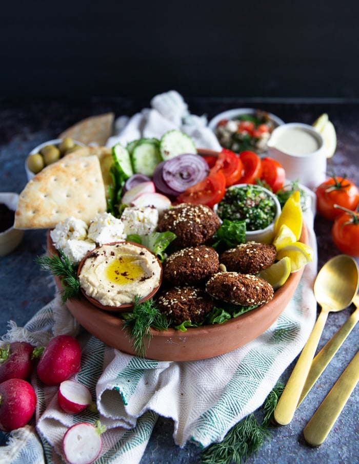 The ingredients are all added to assemble the falafel bowl