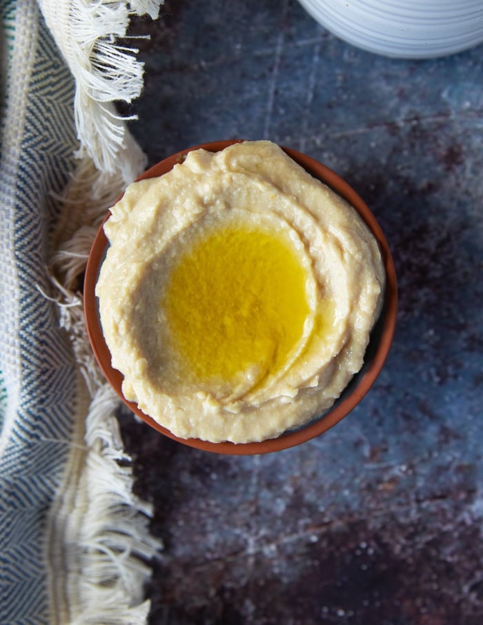 small plate of hummus to go on the falafel bowl