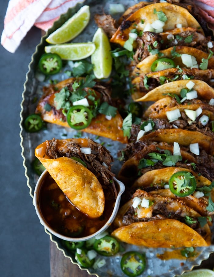 lamb birria tacos close up showing how crunchy the shells are