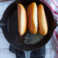 lobster roll buns on a skillet with melted butter to get toasted