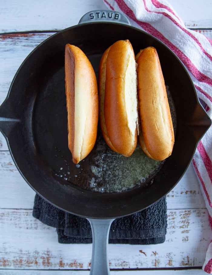 lobster roll buns on a skillet with melted butter to get toasted 