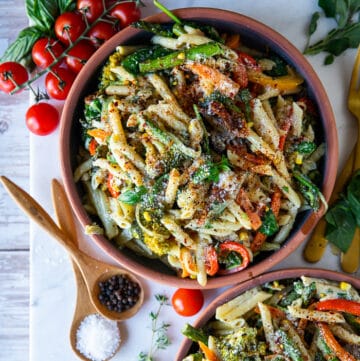 Finished pasta primavera displayed in a bowl.