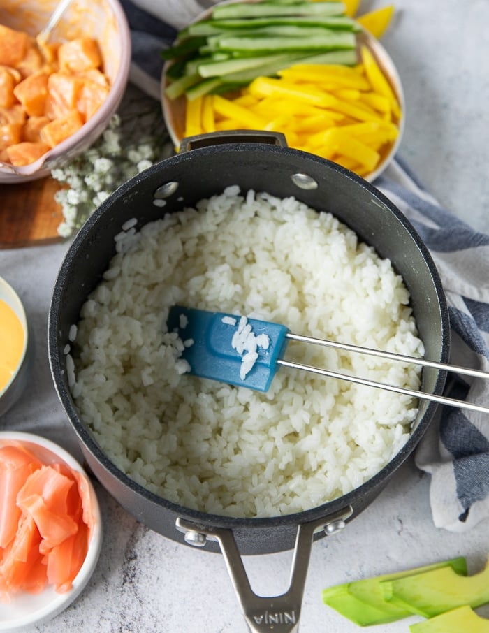 A pot of cooked sushi rice