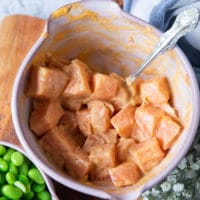 a bowl of sushi grade salmon mixed with spicy mayo to make spicy salmon