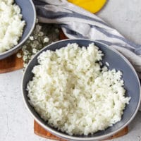 A sushi bowl with sushi rice at the bottom