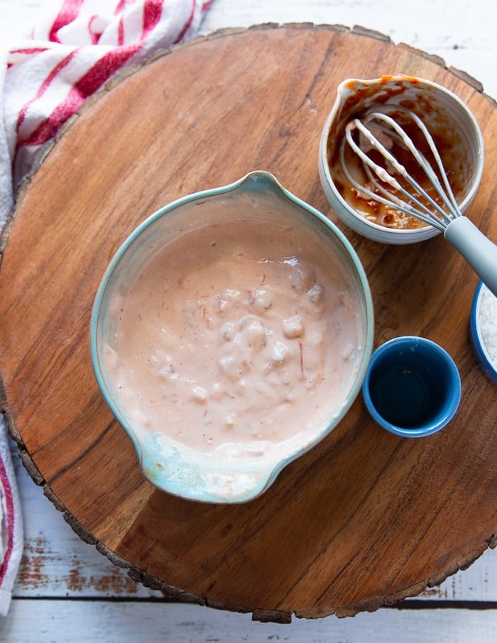 taco salad dressing is mixed and read in a bowl