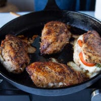 baked chicken caprese out of the oven cooked through