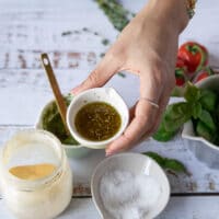 Mixed garlic olive oil in a small bowl.