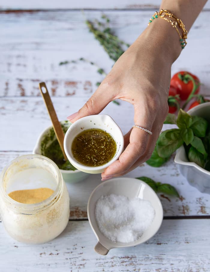 Mixed garlic olive oil in a small bowl.