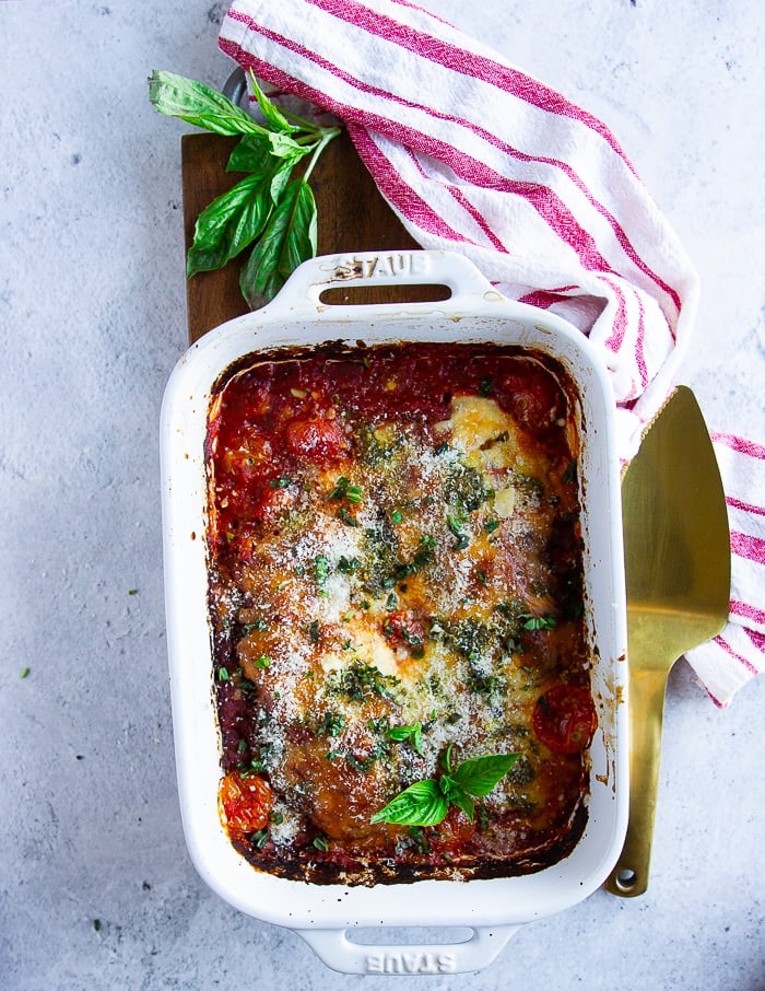 veal parmesan right out of the oven garnished with fresh basil