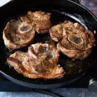 steak is golden and flipped over, and now time to remove it from the skillet