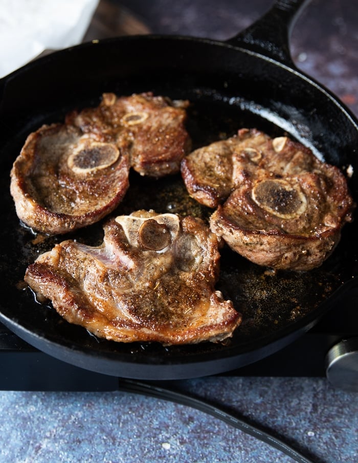 steak is golden and flipped over, and now time to remove it from the skillet