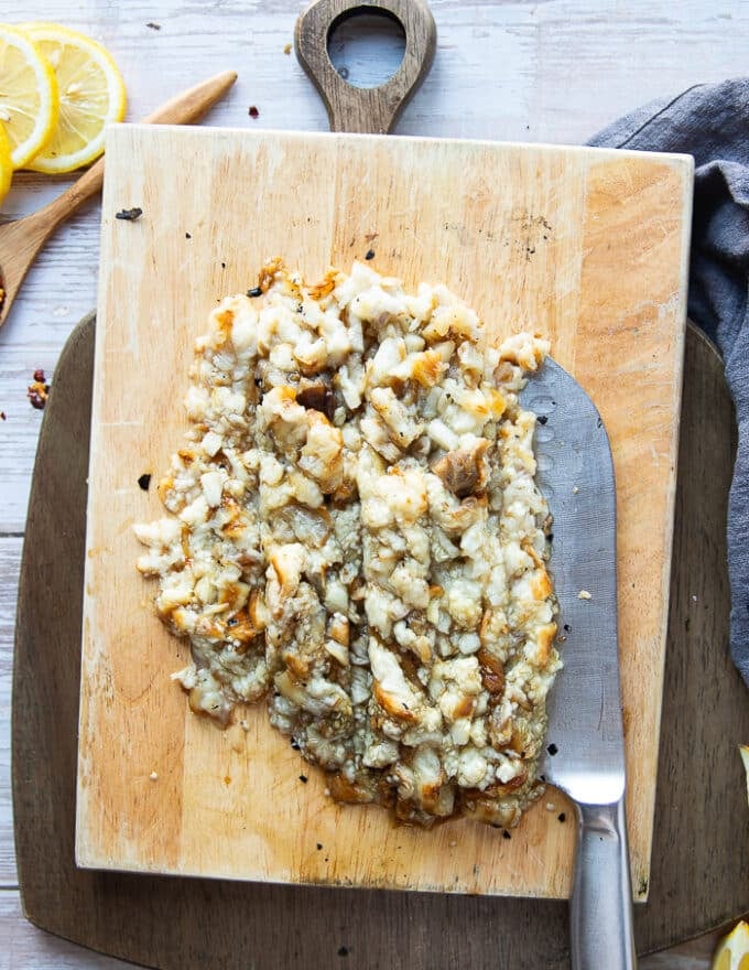 Chopped eggplants on a wooden board