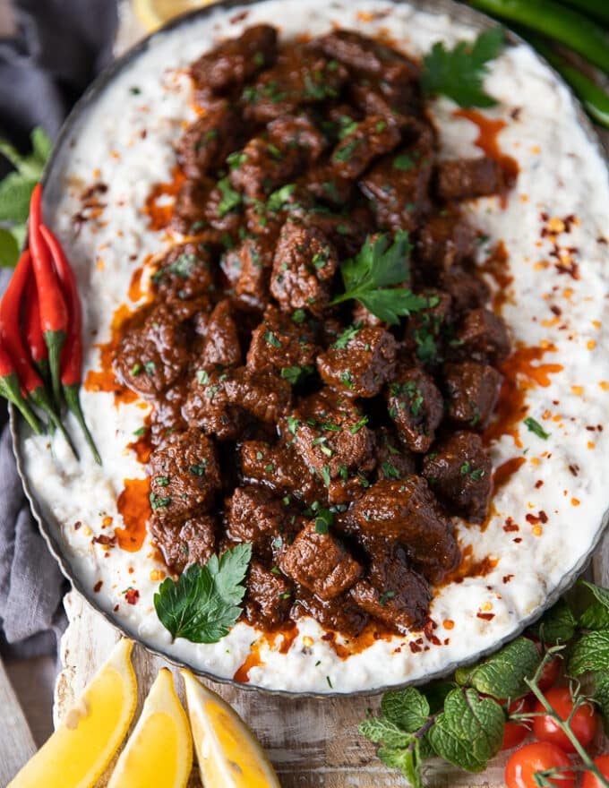 The Lamb stew layered over the yogurt eggplant along the center