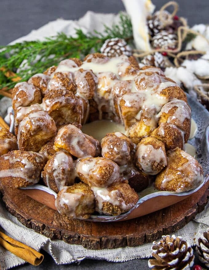 A final plate of cinnamon roll monkey bread with glaze on a plate 
