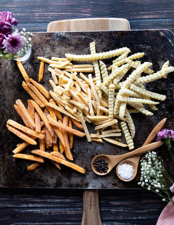 Ingredients for air fryer french fries, frozen french fries , salt and oil spray