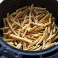 golden crisp and delicious french fries cooked in the air fryer