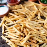 close up of the air fryer frozen french fries showing how crisp and perfect the texture is