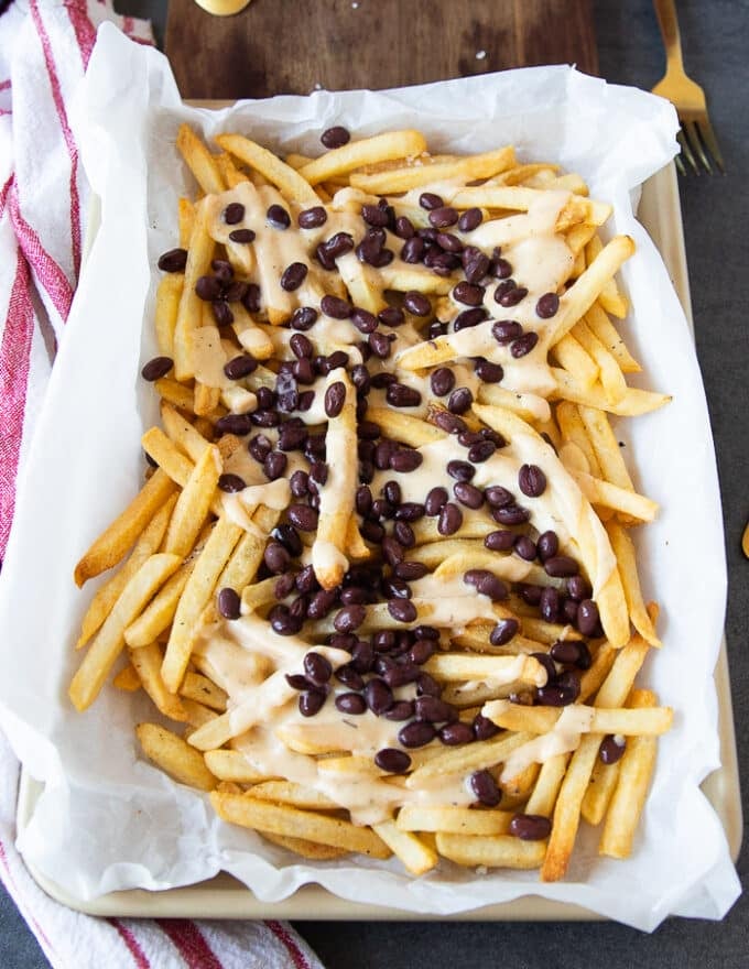 Load up on the nacho fries, starting with cheese, taco beef, and beans 