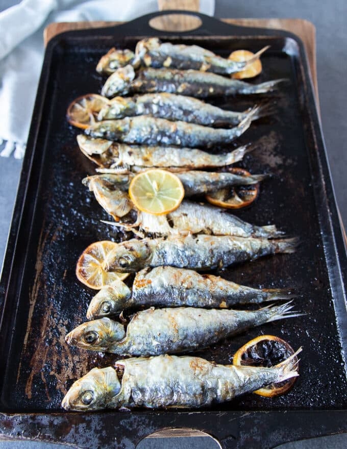 Baked sardines out of the oven cooked and ready