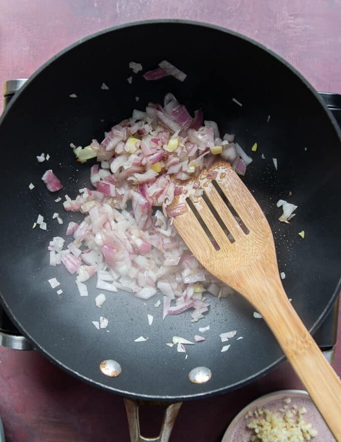first step to make lamb tacos is to cook onions in oil until soft