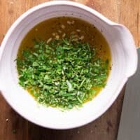 herb butter ingredients all added into a bowl