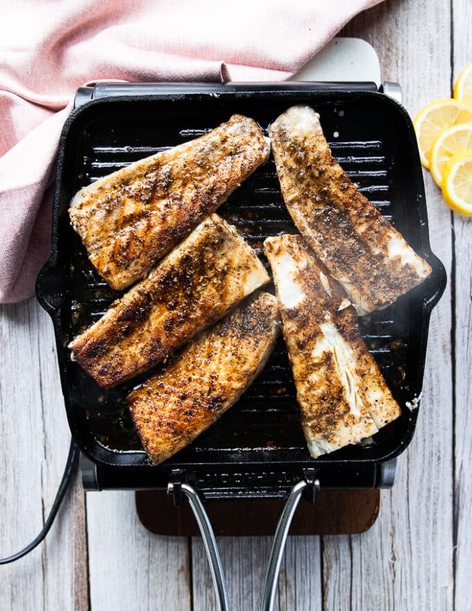 cooked mahi mahi fillets on the grill finished cooking and ready to serve.